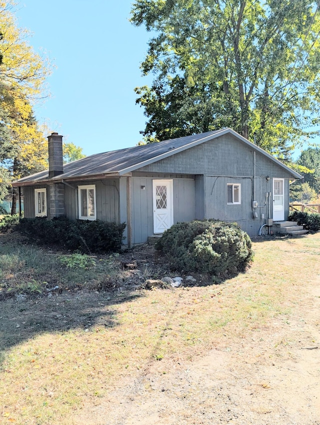 exterior space with a yard