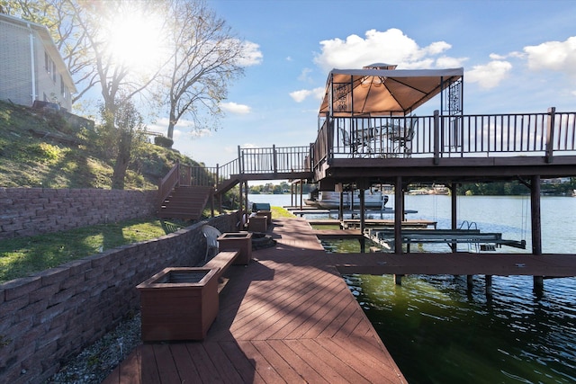 view of dock with a water view