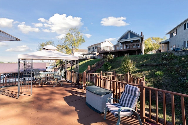 view of patio featuring a gazebo and a deck