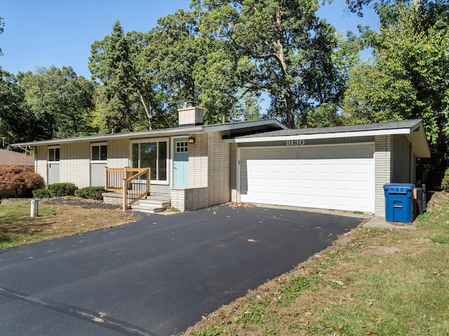 ranch-style house with a garage