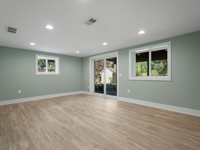 empty room with light wood-type flooring