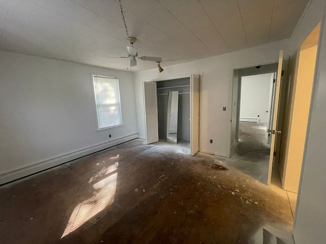 unfurnished bedroom featuring a baseboard radiator and ceiling fan