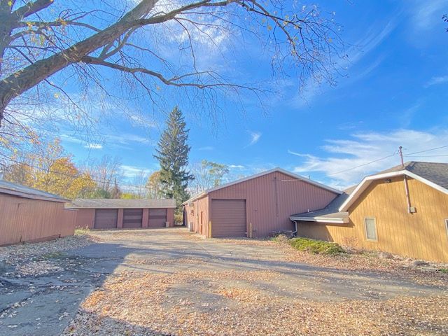 view of outbuilding featuring a garage