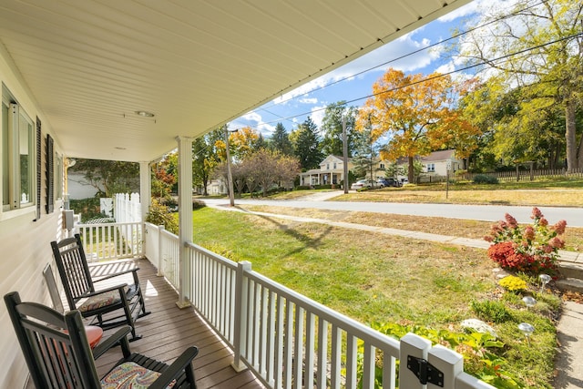 wooden deck featuring a porch