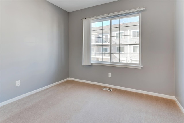 view of carpeted spare room