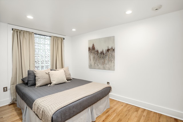 bedroom featuring wood-type flooring