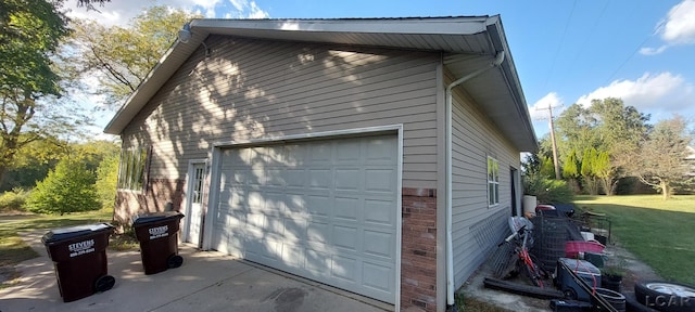 garage with a lawn