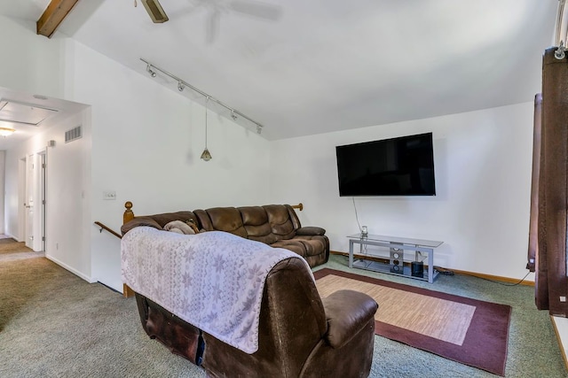 carpeted living room with lofted ceiling with beams, ceiling fan, and rail lighting