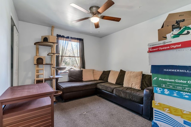 living room with ceiling fan and carpet floors