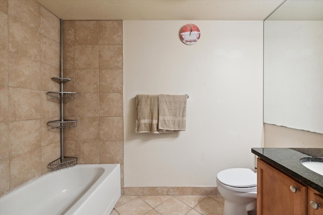 full bathroom with toilet, vanity, tile patterned floors, and tiled shower / bath combo