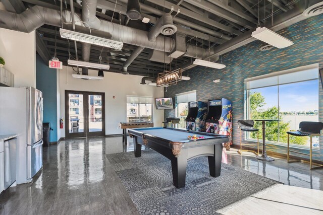 3320 Spinnaker Ln Unit 11B, Detroit, MI 48207 - game room with billiards table, wallpapered walls, baseboards, french doors, and a high ceiling
