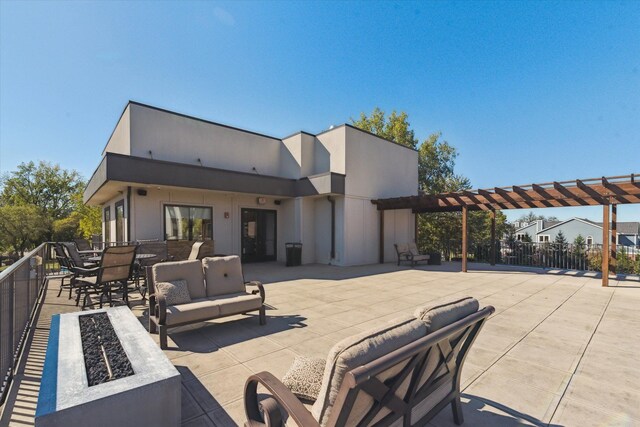 3320 Spinnaker Ln Unit 11B, Detroit, MI 48207 - view of patio with outdoor dining space, an outdoor living space with a fire pit, and a pergola