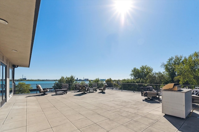 view of patio / terrace featuring a water view