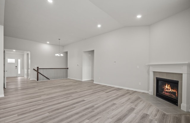 unfurnished living room with light hardwood / wood-style floors and a fireplace