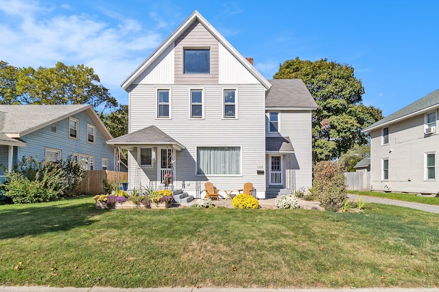 front facade with a front yard