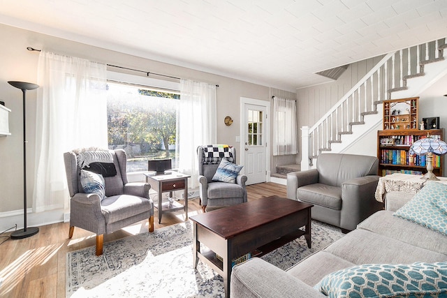 living room with light hardwood / wood-style floors