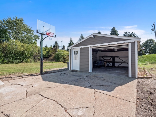 garage with a yard