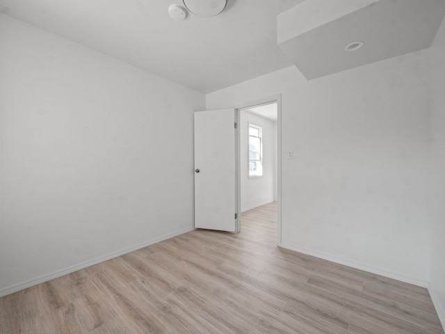 empty room with light wood-type flooring