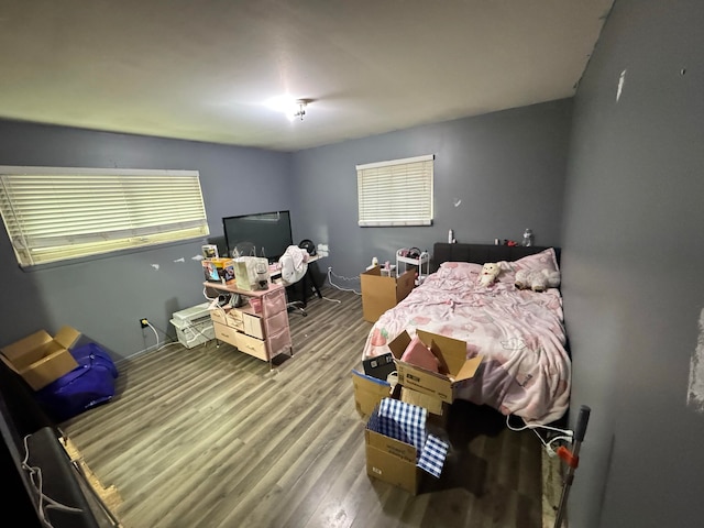 bedroom featuring hardwood / wood-style flooring