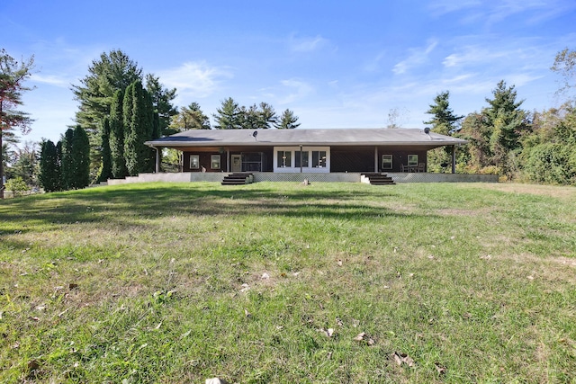 exterior space featuring a lawn