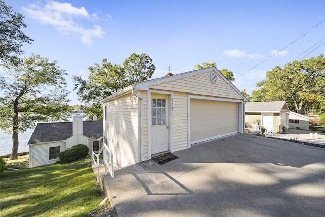 garage with a yard