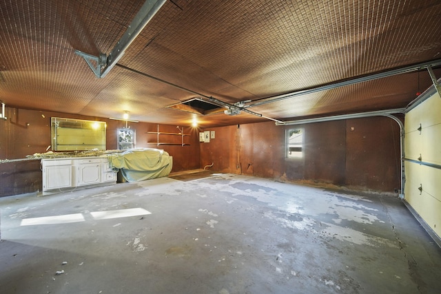 interior space featuring a workshop area and wooden walls