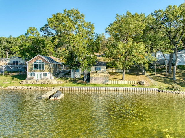 property view of water featuring a boat dock