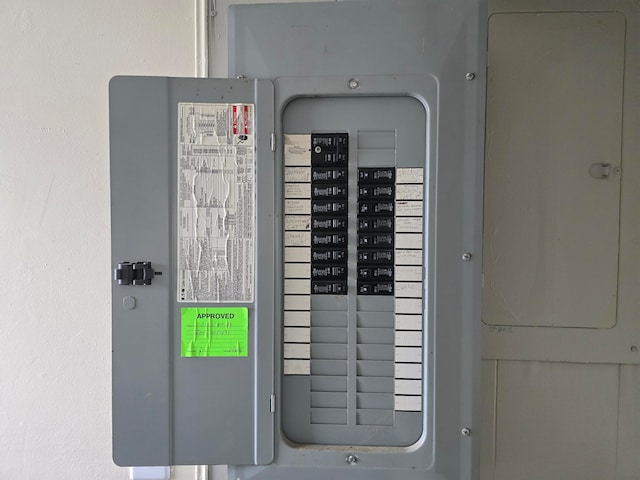 utility room featuring electric panel