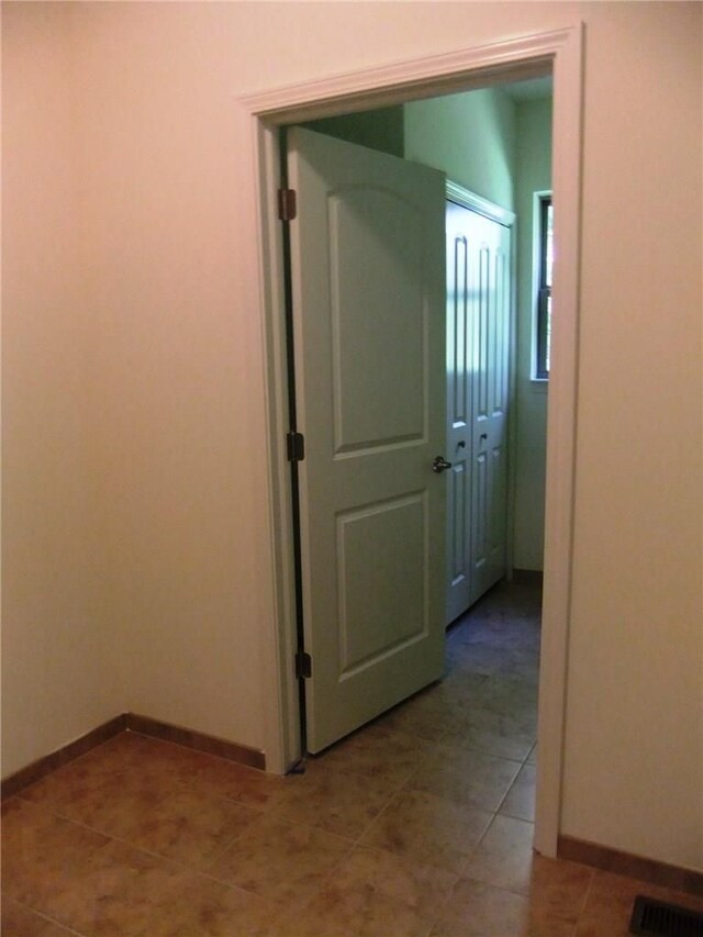 48945 Tuscan Hls, Plymouth, MI 48170 - empty room featuring baseboards and light tile patterned floors