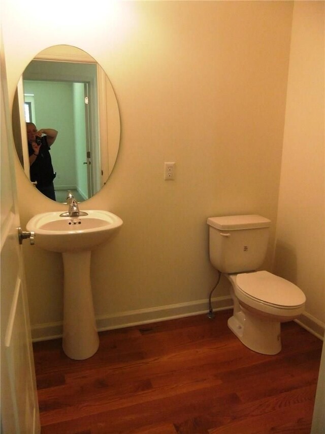 48945 Tuscan Hls, Plymouth, MI 48170 - half bath with wood finished floors, baseboards, and toilet