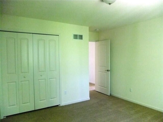 48945 Tuscan Hls, Plymouth, MI 48170 - unfurnished bedroom with carpet floors, a closet, and baseboards
