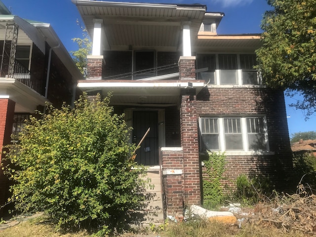 view of front facade with a balcony