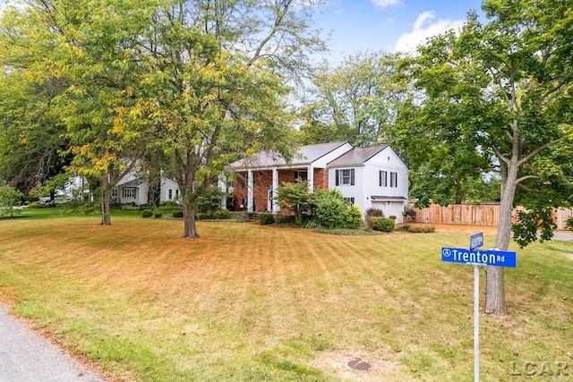 view of front of home with a front lawn