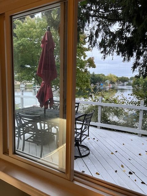 entryway with a water view