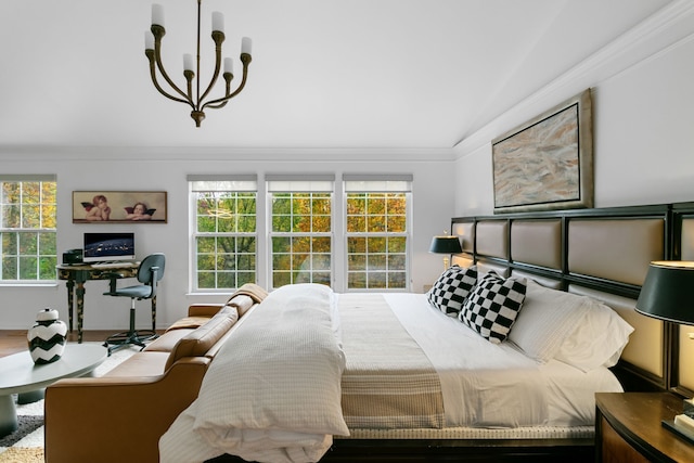 bedroom featuring an inviting chandelier, multiple windows, lofted ceiling, and crown molding