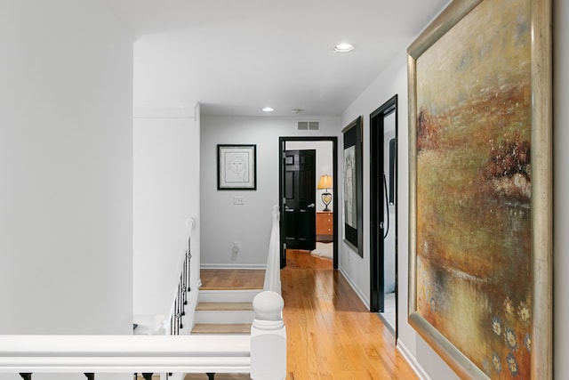 corridor featuring light wood-type flooring