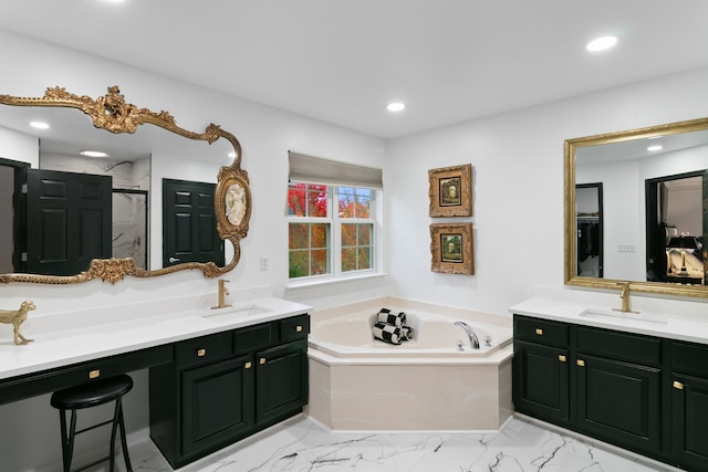 bathroom featuring vanity and separate shower and tub