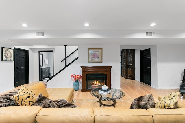 living room with light hardwood / wood-style floors