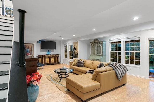 living room with light hardwood / wood-style flooring