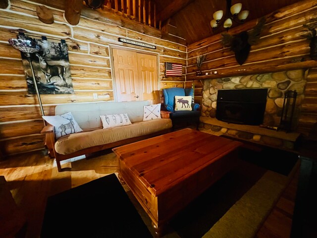 living room featuring a stone fireplace, wood-type flooring, rustic walls, and high vaulted ceiling