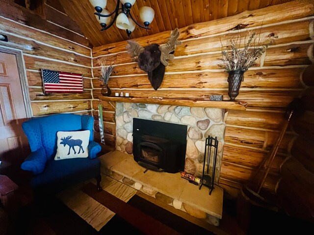 living area featuring wood ceiling, rustic walls, and vaulted ceiling