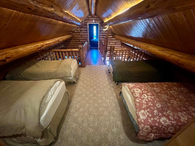 carpeted bedroom with lofted ceiling with beams, wooden ceiling, and log walls