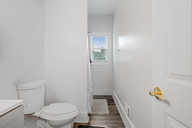 5015 Vancouver St, Detroit, MI 48204 - full bathroom with vanity, toilet, wood finished floors, and baseboards