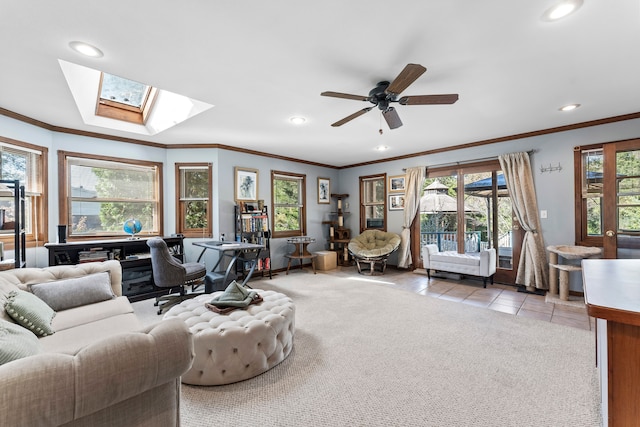 living room with plenty of natural light and ceiling fan