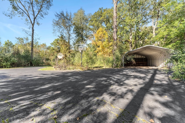 exterior space with a carport