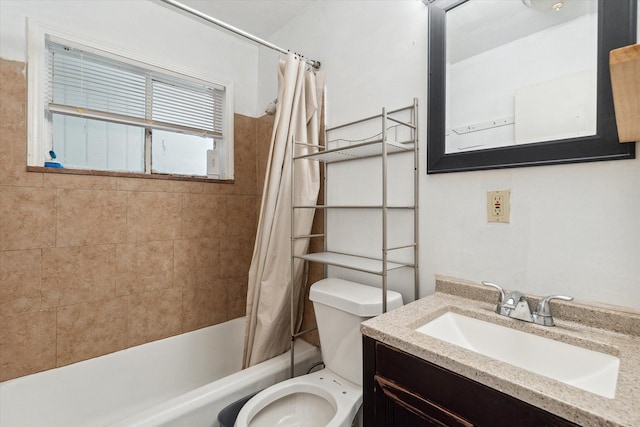 full bathroom featuring vanity, toilet, and shower / bath combo with shower curtain