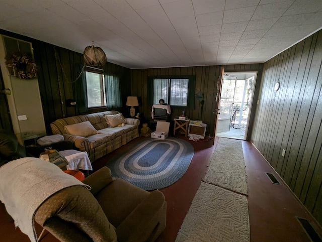 living room featuring wooden walls