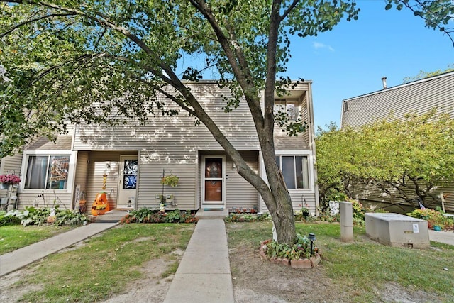 view of front of house with a front lawn