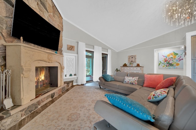 living room featuring a chandelier, a stone fireplace, lofted ceiling, and crown molding