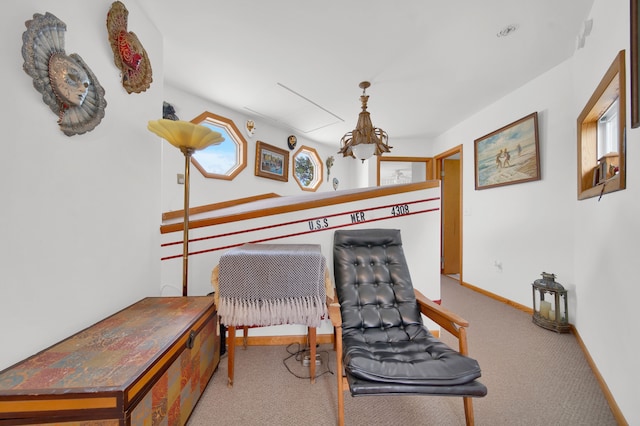 living area featuring light colored carpet